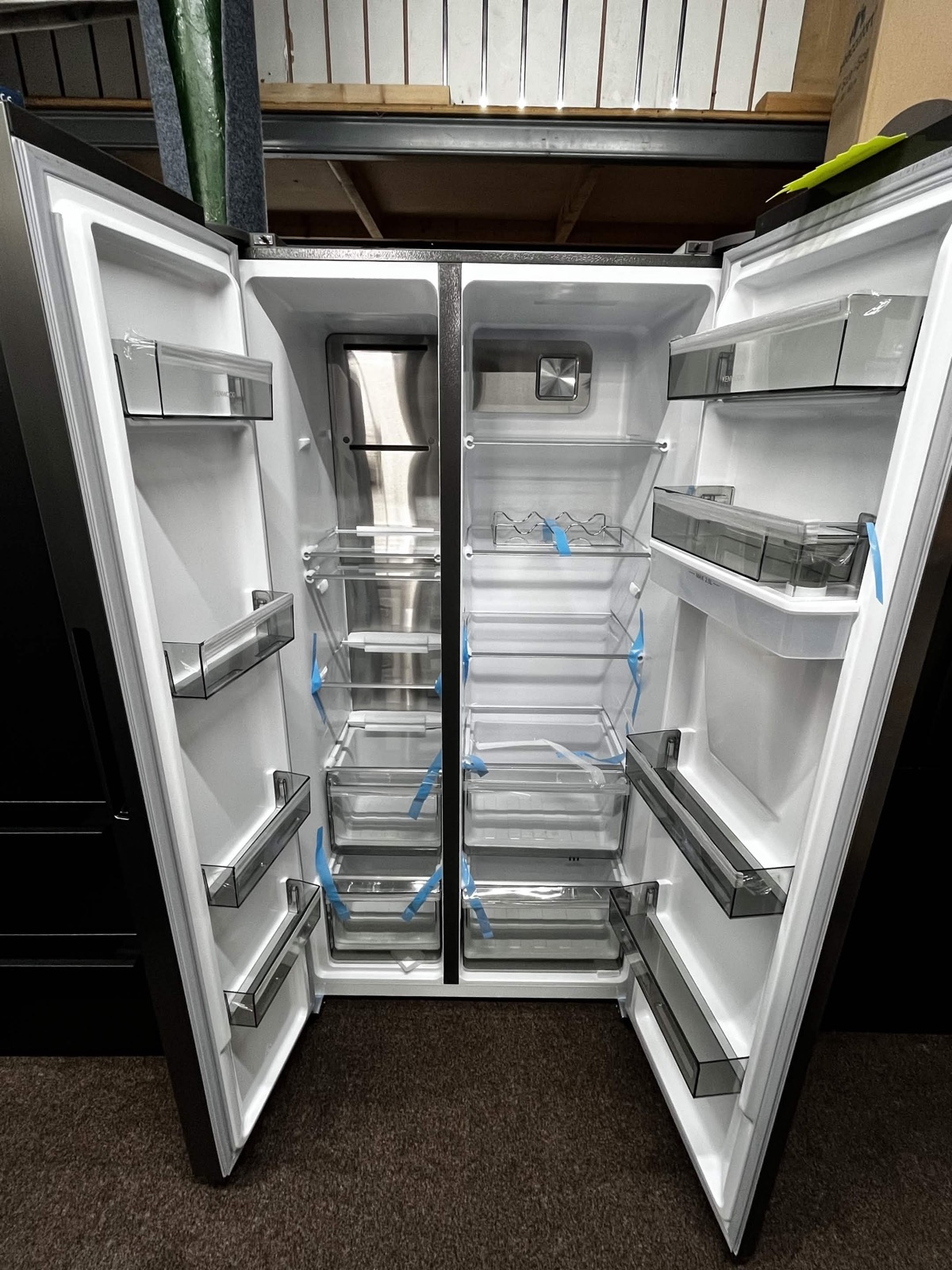 Open fridge freezer showing interior storage